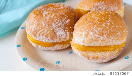 Berlin ball sweets on a plate on the table Berlin ball sweets on a plate on the table 92557067