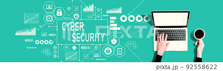 Cyber security theme with person using a laptop 92558622