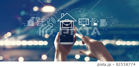 Telework theme with person using smartphone 92558774