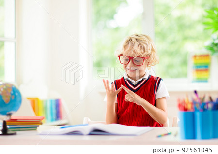 Kids doing homework. Children go back to school. Kids doing homework. Children go back to school. 92561045