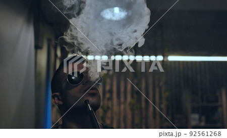 Arabic jordanian young man smokes a hookah. 92561268