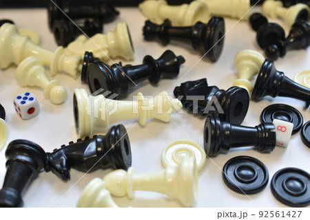 Chess pieces lie randomly on the table. Chess pieces lie randomly on the table. 92561427