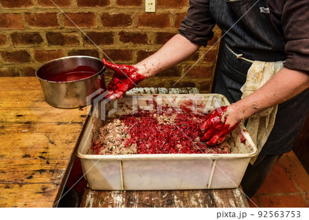Handmade blood sausage preparation, Argentine tradition, Pampas, Patagonia Handmade blood sausage preparation, Argentine tradition, Pampas, Patagonia 92563753