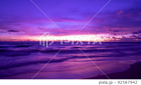 Cyberpunk color trend popular background.Nature beautiful Light Sunset or sunrise over sea Colorful dramatic majestic scenery Sky with Amazing clouds and waves in sunset sky purple light cloud Cyberpunk color trend popular background.Nature beautiful Light Sunset or sunrise over sea Colorful dramatic majestic scenery Sky with Amazing clouds and waves in sunset sky purple light cloud 92567942
