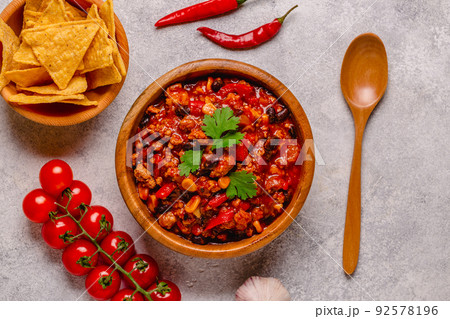 Chili Con Carne in bowl on dark background. 92578196