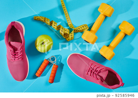 Female sport shoes and equipment top view, copy space. Active lifestyle, body care concept. 92585946