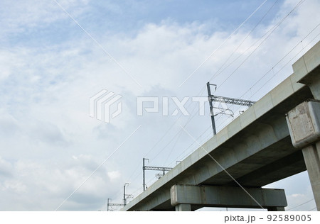 electricity pole on electric sky train track in sunny day 92589005