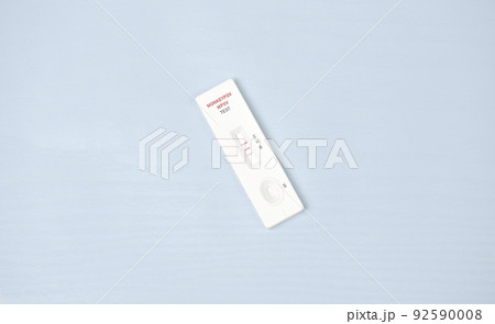 Monkeypox virus (MPXV) positive test result with medical cassette on white wooden background Monkeypox virus (MPXV) positive test result with medical cassette on white wooden background 92590008