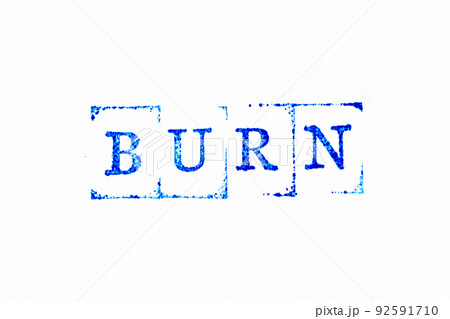 Blue color ink rubber stamp in word burn on white paper background 92591710
