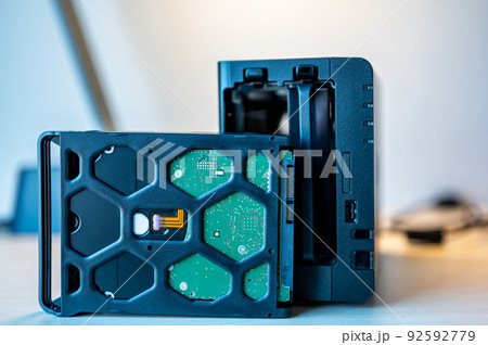 network attached storage NAS with a single bay pulled setup at a home office and remote work redundancy 92592779