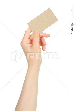 Hand holds blank business card on white background 92593058