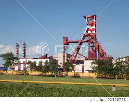 Elevator for raising mineral resources. Mine area with a mine shaft tower 92596748