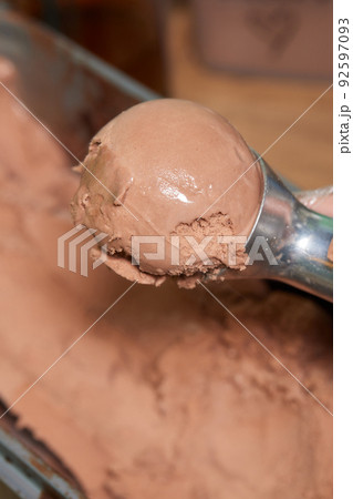 ice cream scooped out of container. close-up. 92597093