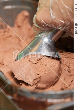 ice cream scooped out of container. close-up. ice cream scooped out of container. close-up. 92597101