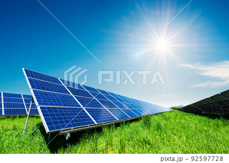 Solar panel on blue sky background Solar panel on blue sky background 92597728