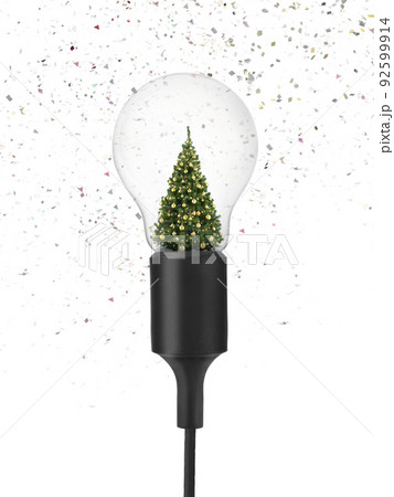 Decorated Christmas tree inside of light bulb on White Background, concept christmas festival Decorated Christmas tree inside of light bulb on White Background, concept christmas festival 92599914