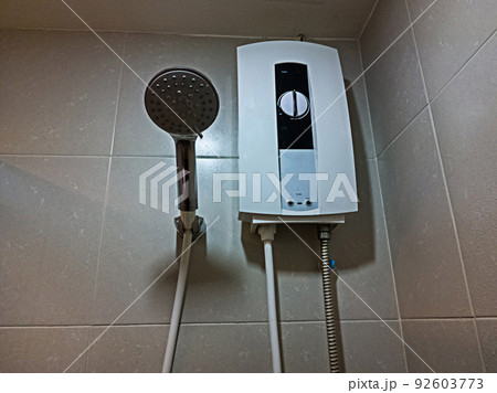 Shower and electric water heater in the bathroom Shower and electric water heater in the bathroom 92603773