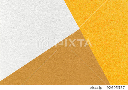 Texture of craft white, yellow and light brown shade color paper background. Structure of abstract cardboard 92605527