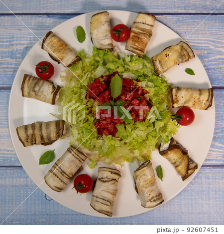 RECIPE FOR GRILLED AUBERGINE ROLL STUFFED WITH RICOTTA CHEESE AND SALAD WITH VINAIGRETTE RECIPE FOR GRILLED AUBERGINE ROLL STUFFED WITH RICOTTA CHEESE AND SALAD WITH VINAIGRETTE 92607451