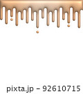 melted brass dripping on white background 92610715