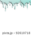 melted mint chocolate dripping on white background 92610718