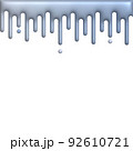 melted silver dripping on white background 92610721