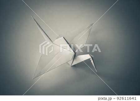White paper crane origami isolated on blank background 92611641