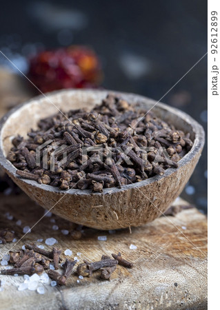 clove spices on the table during the cooking of food 92612899
