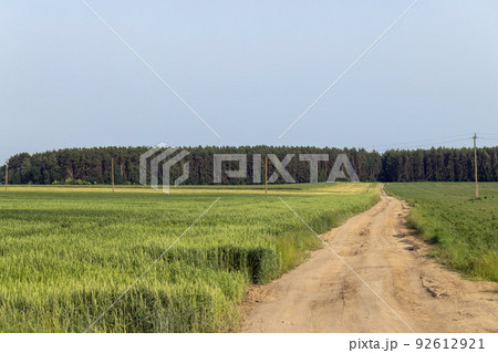 unpaved highway in rural areas 92612921