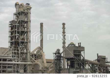 Factory. Cement factory seen from the outside on a cloudy day, in Spain. Europe. Horizontal photography. 92613255