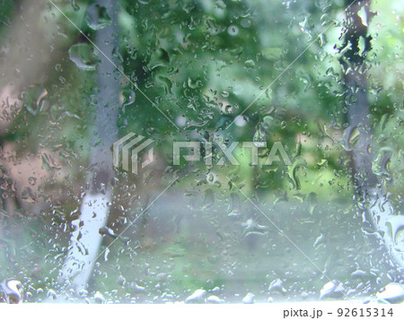 rainy days rain drops on the window surface rainy days rain drops on the window surface 92615314