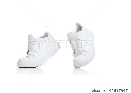 Casual, stylish, white sneakers isolated over white studio background 92617947