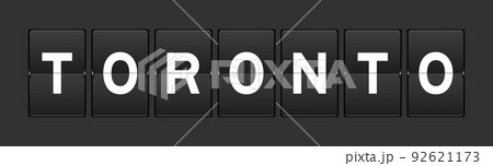 Black color analog flip board with word toronto on gray background 92621173