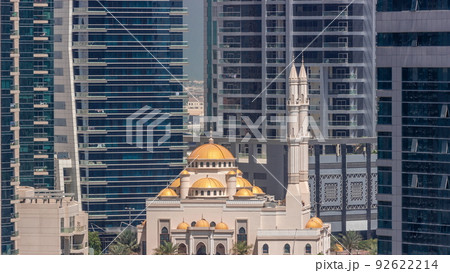 Dubai Marina skyline with Mohammad Bin Ahmed Al Mulla mosque aerial timelapse 92622214