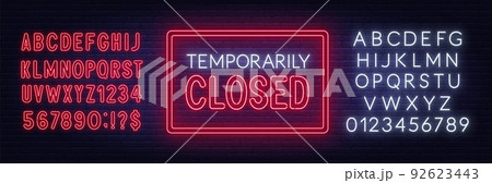 Temporarily closed neon sign on brick wall background. 92623443