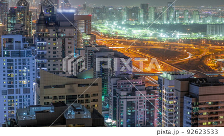 Dubai luxury residential district with golf club night timelapse. Dubai luxury residential district with golf club night timelapse. 92623533
