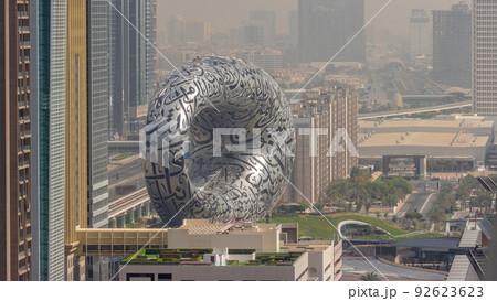 Museum of the Future exhibition space aerial all day timelapse with iconic torus shape Museum of the Future exhibition space aerial all day timelapse with iconic torus shape 92623623