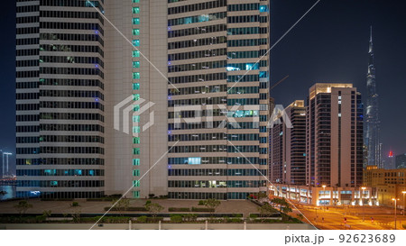 Aerial panoramic view to Dubai downtown skyscrapers night timelapse. Aerial panoramic view to Dubai downtown skyscrapers night timelapse. 92623689