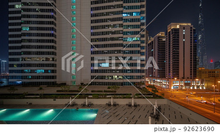 Aerial panoramic view to Dubai downtown skyscrapers night timelapse. Aerial panoramic view to Dubai downtown skyscrapers night timelapse. 92623690
