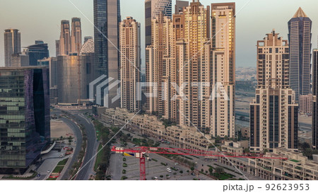 Bay Avenue during sunrise with modern towers in Business Bay aerial timelapse, Dubai Bay Avenue during sunrise with modern towers in Business Bay aerial timelapse, Dubai 92623953
