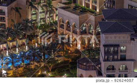 Aerial view of swimming pool in Old Town Island from above night timelapse. Aerial view of swimming pool in Old Town Island from above night timelapse. 92624007