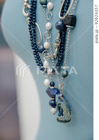 Costume jewelry.A necklace made of costume jewelry. 92624357