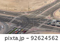 Bussy traffic on the road intersection in Dubai downtown aerial timelapse, UAE 92624562