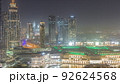 Dubai downtown with fountains and modern futuristic architecture aerial all night timelapse 92624568