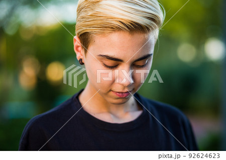 Tomboy androgynous lesbian non binary beauty in casual clothes gender lgtbi sex education. Sexual identity lesbian, homosexuality  92624623