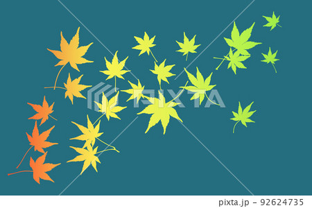 舞い上がるカラフルな紅葉のシルエット　緑がかった青の背景 92624735
