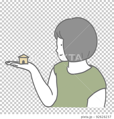 ミニチュアの家を見つめる女の子 92628237
