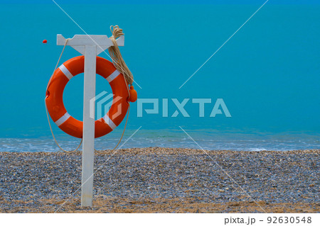 Life round mexico preserver beach sea lifebuoy protection lifesaver ring, concept help sky from sos from water sun, weather seascape. Caribbean saver gold, Life round mexico preserver beach sea lifebuoy protection lifesaver ring, concept help sky from sos from water sun, weather seascape. Caribbean saver gold, 92630548