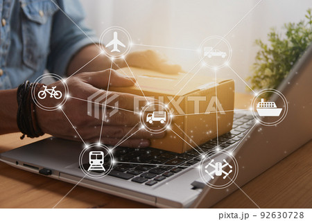 Hand of Casual Businessman Catch Parcel on Laptop and Logistic Icon 92630728