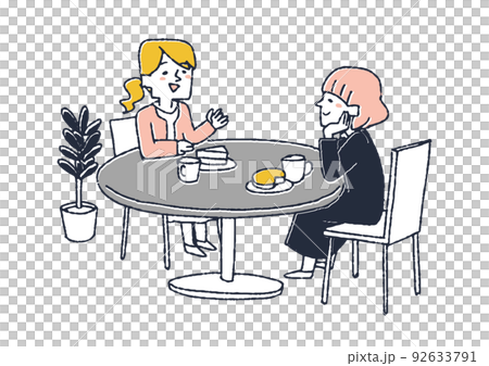 兩個女人坐在桌邊，在咖啡店或咖啡館裡愉快地聊天 92633791